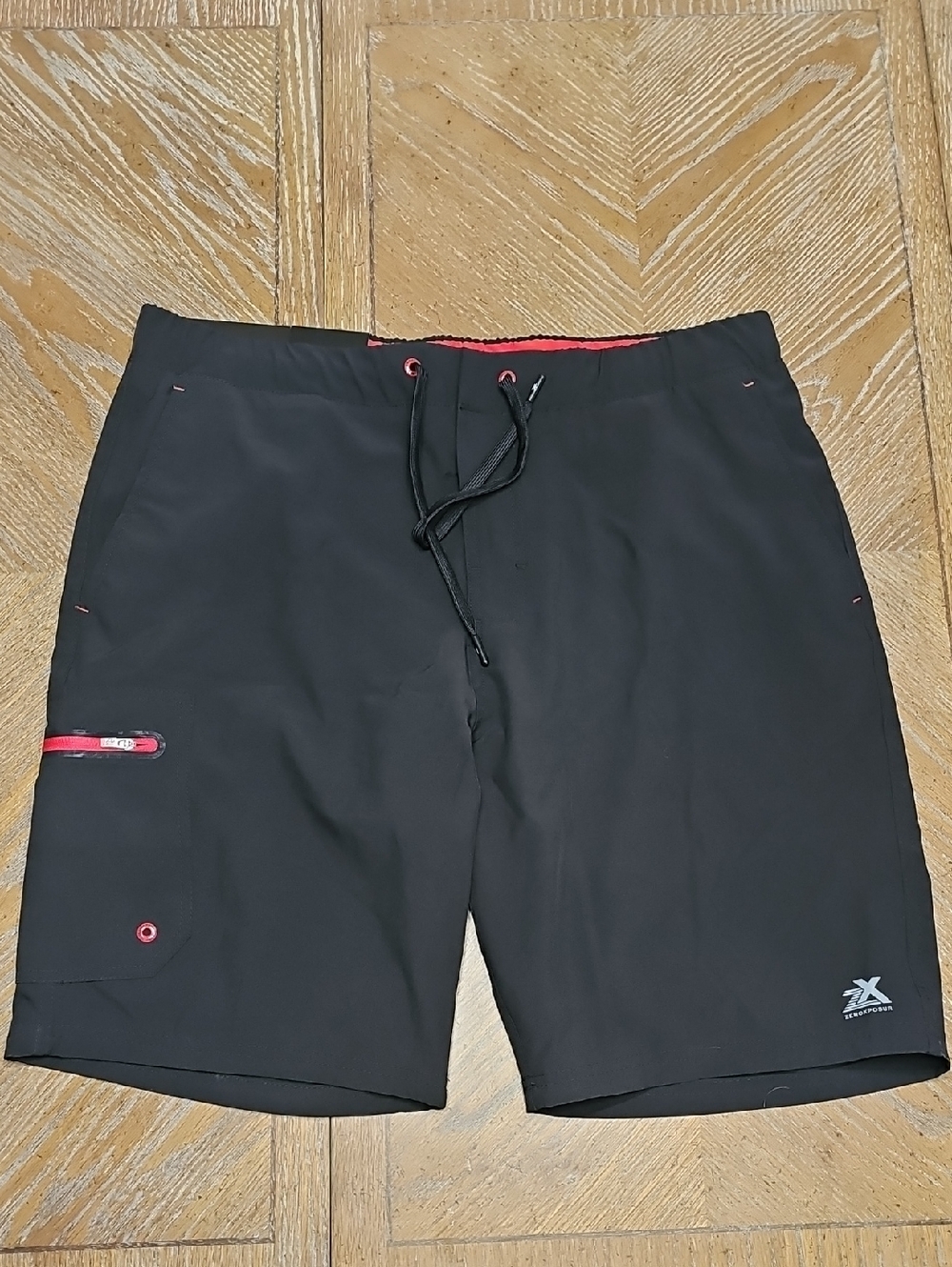 ZeroXposur Black Swim Board Shorts with Red Trim
